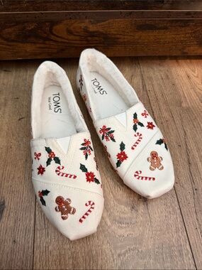 TOMS Cream Holiday Embroidered Slip-Ons with Festive Motifs